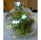 Boule de Noël transparente et contenant des décorations