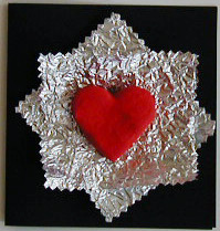 Carte décorée d'un coeur et de papier métalisé